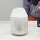 Illustration for article titled Control This Beautiful Ceramic Radio By Touching Its Palladium Surface